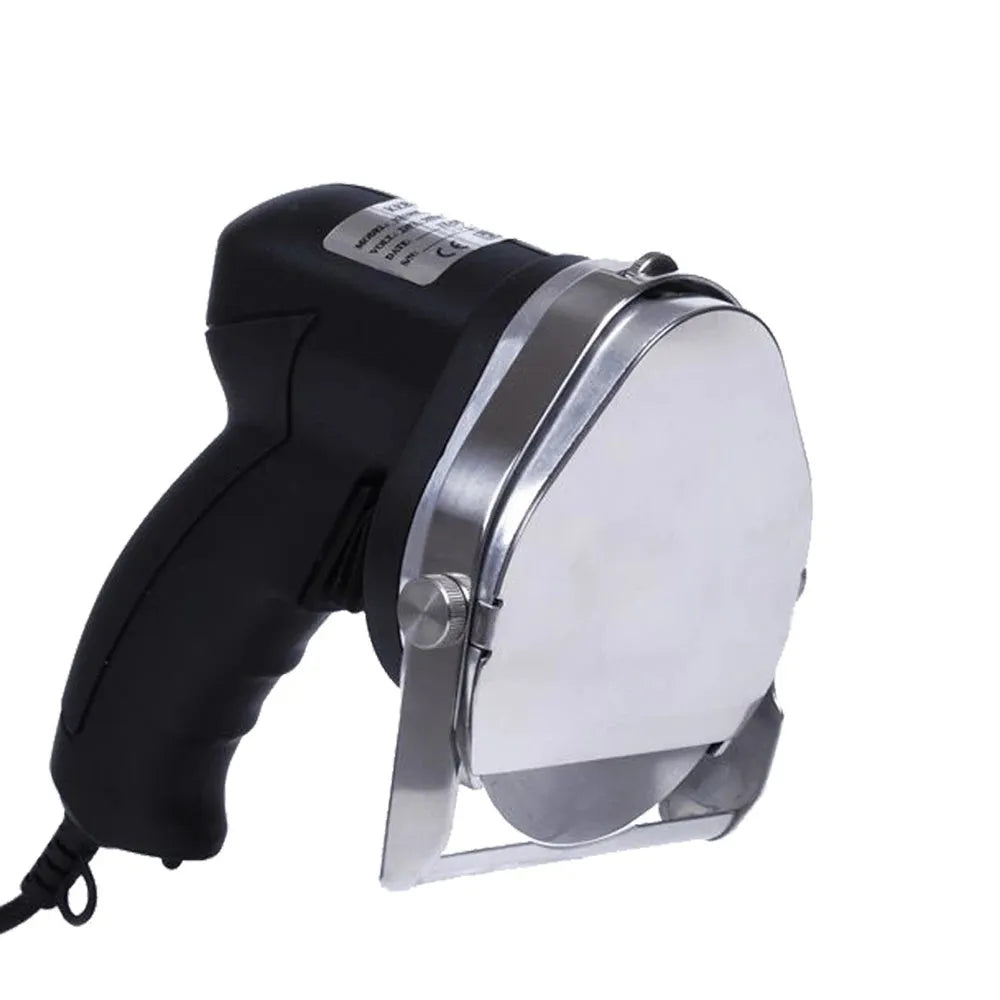 KS-100E black electric meat cleaver with adjustable blade for turkey barbecue machines on a kitchen counter.