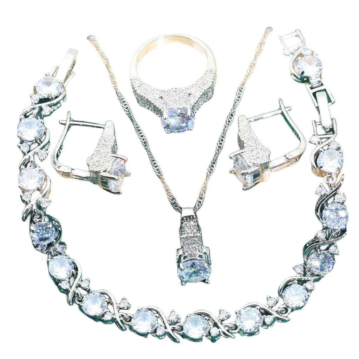 Four-piece bridal jewellery set showing necklace, bracelet, earrings and ring with alloy pendant and water wave chain