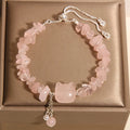 Women's crystal gravel bracelet with kitten charm in pink or agate colour.