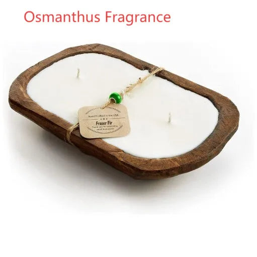 Lavender-scented soy wax candle in a wooden basin with a wooden wick