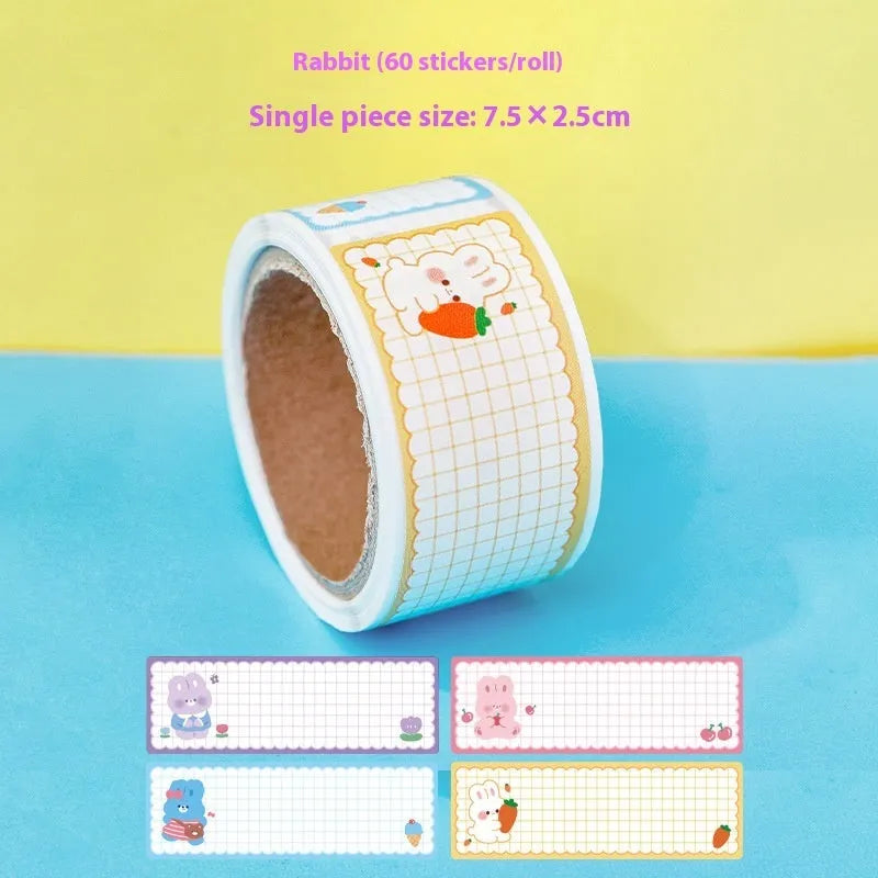 Roll of colourful cartoon name tape stickers showing dinosaur, astronaut, rabbit, and girl designs.