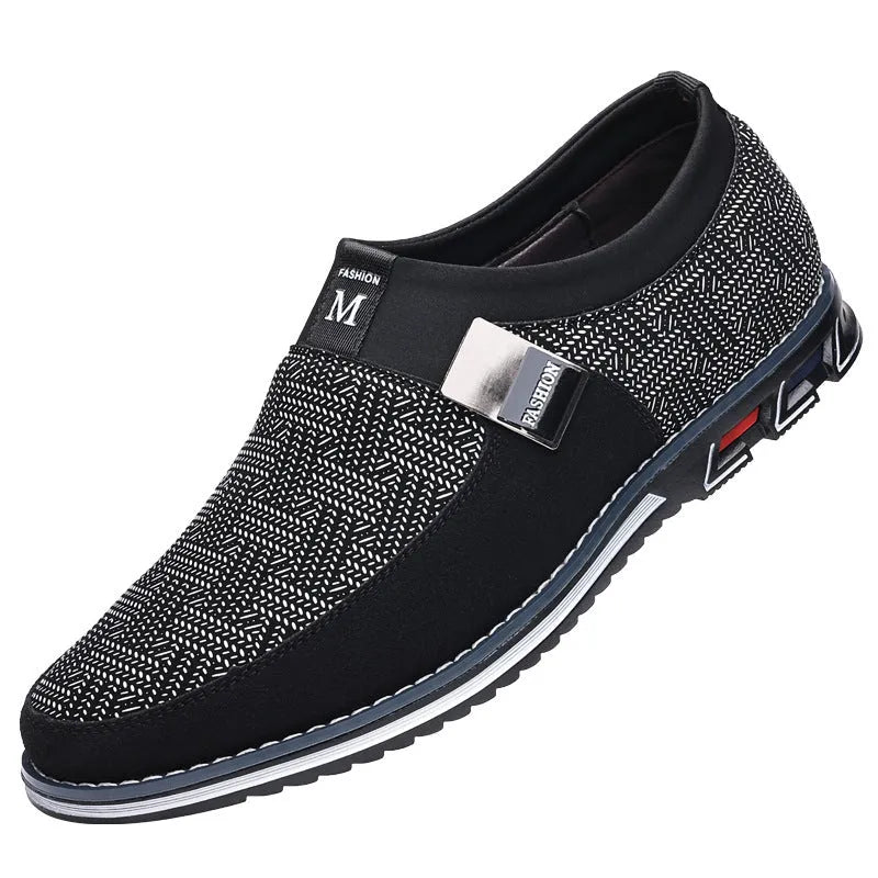 Men's grey and white synthetic leather slip-on loafers with a square toe and flat rubber sole.