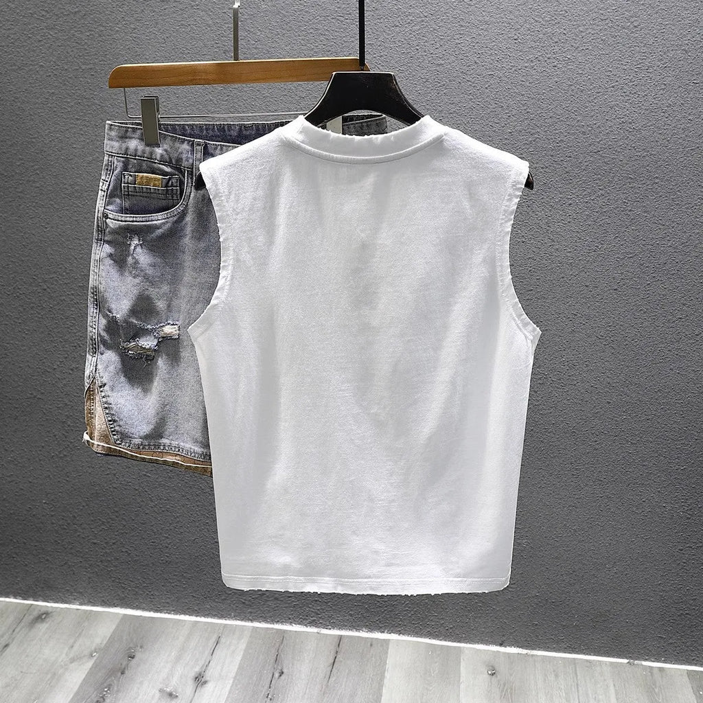 Men's solid colour loose fit cotton sleeveless t-shirt on hanger, black and white options.