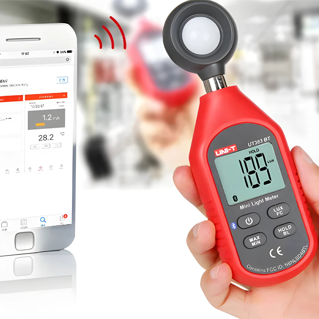 UT383 mini digital lux meter measuring light level with backlit LCD display
