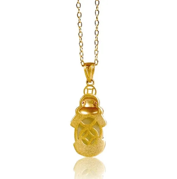 Hetian jade antique gold pendant necklace with cartoon pi xiu design and cross chain.