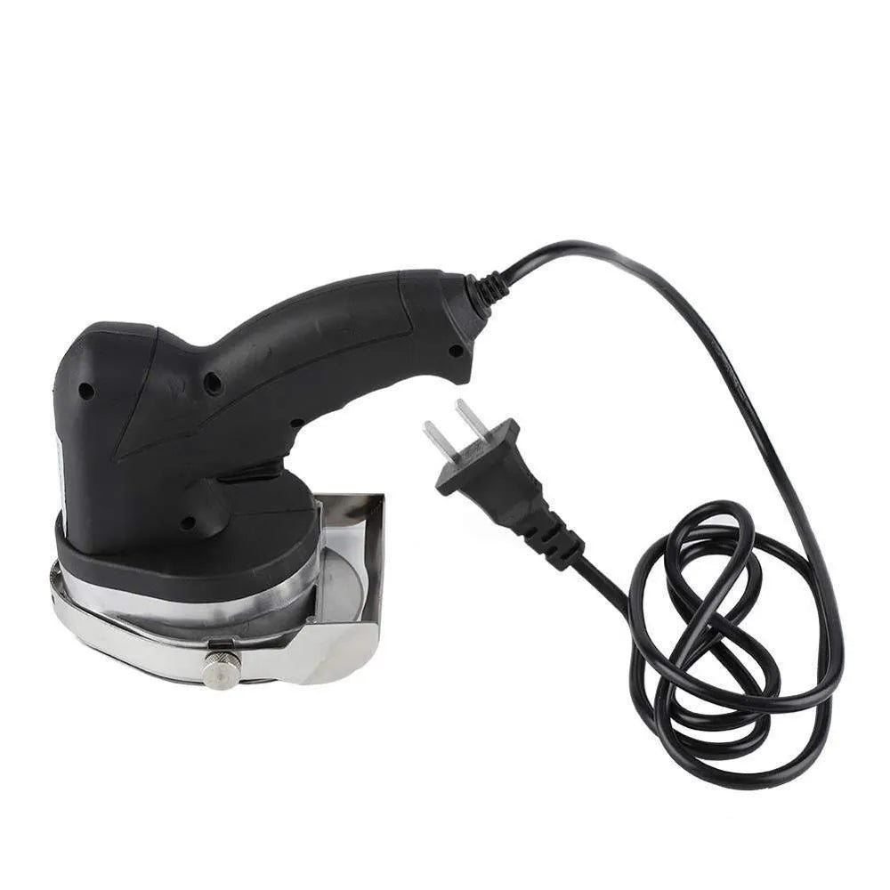 KS-100E black electric meat cleaver with adjustable blade for turkey barbecue machines on a kitchen counter.