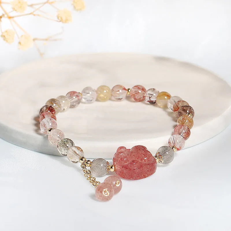 Women's handmade crystal bracelet featuring natural stone with zodiac animal motifs