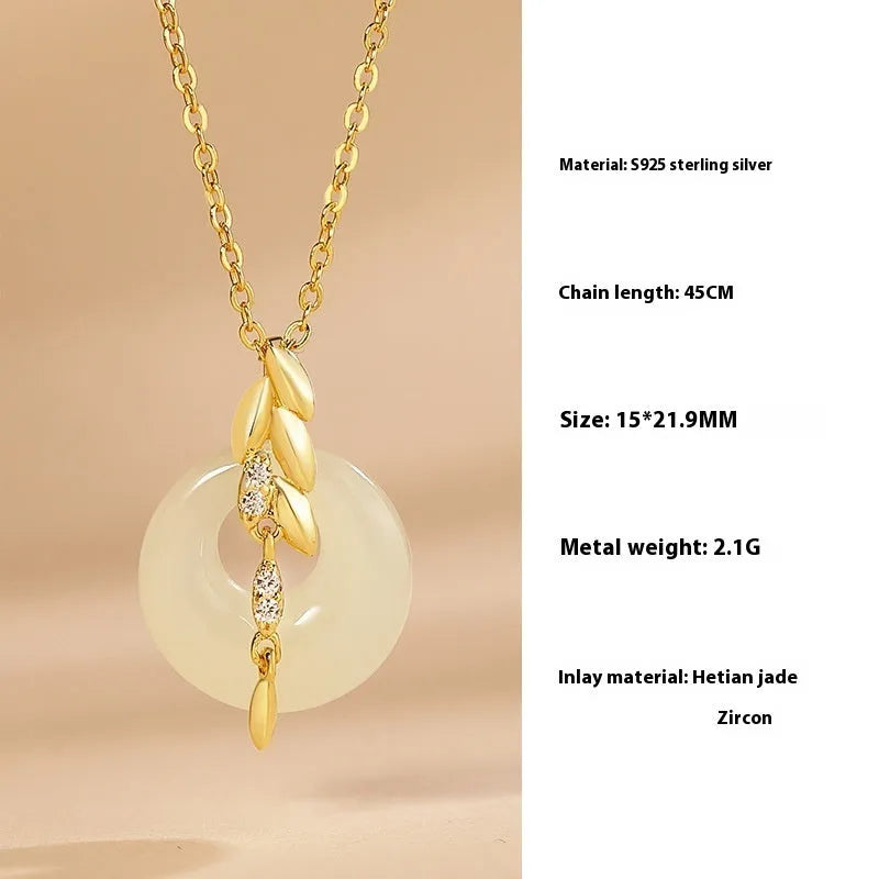 Chinese style wheat necklace with 925 silver chain and jade-inlaid pendant on white background