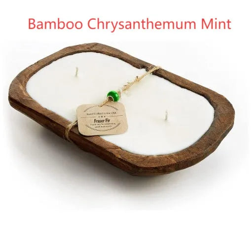 Lavender-scented soy wax candle in a wooden basin with a wooden wick