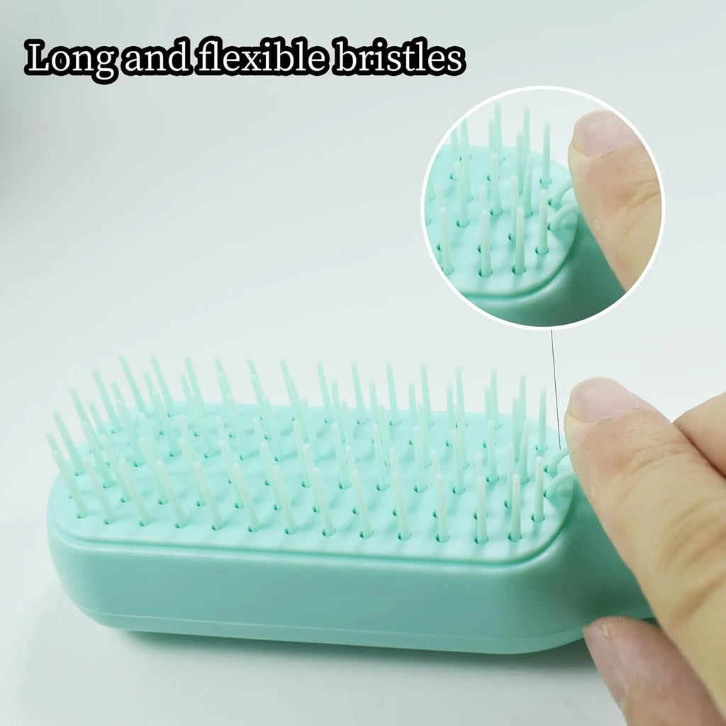 Blue, pink, and white dual-sided soft bristle brush for grooming small dogs