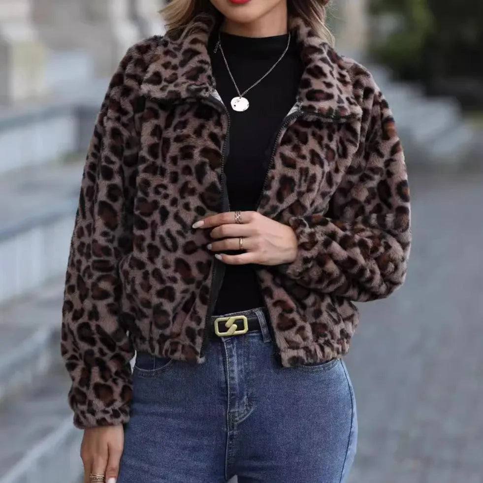 Women's loose long sleeve leopard print plush coat with full zip on a hanger