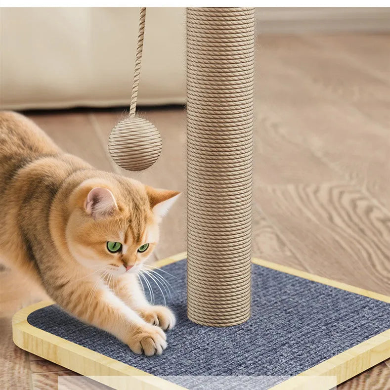 Natural wood tone cat climbing frame with a red hanging ball toy and beige carpet leather scratching surfaces.