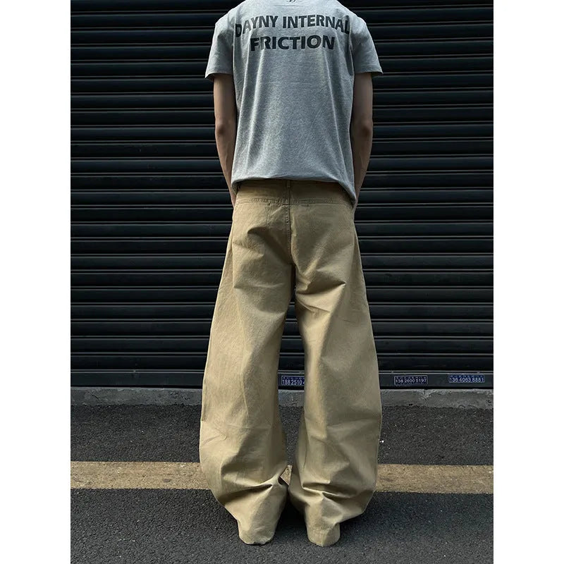 Men's khaki cotton straight-leg trousers laid flat showing American retro casual style