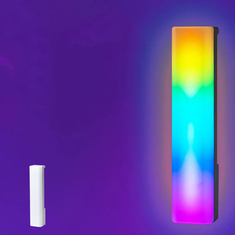 3D RGB voice-activated table lamp with colourful lights on a desk, showing white shell option.