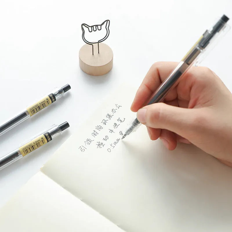 12 black retractable gel pens with 0.5mm tips and two spare refills