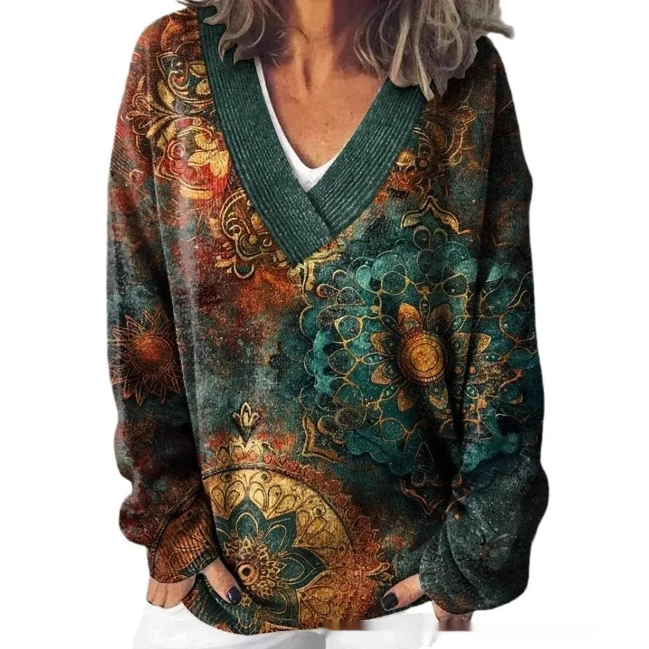 Women's V-neck long sleeve sweatshirt with a textured 3D floral print pattern in a retro style.