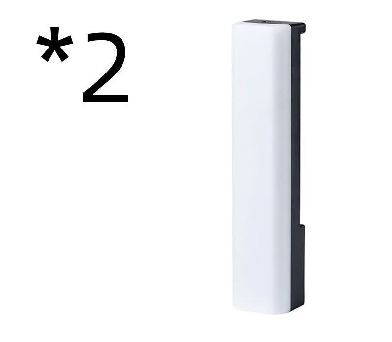 3D RGB voice-activated table lamp with colourful lights on a desk, showing white shell option.