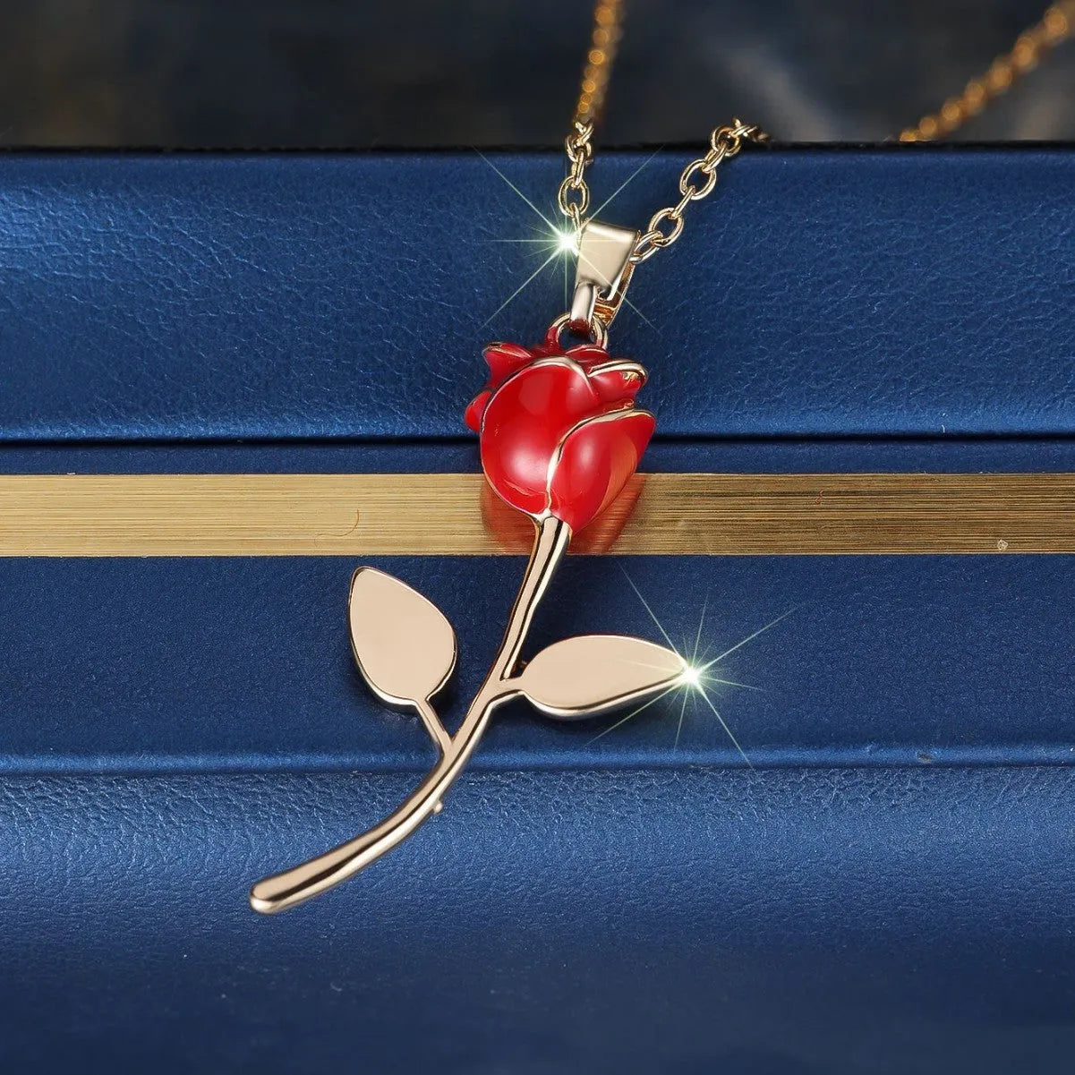 Close-up of a champagne gold rose-shaped copper pendant on an O-ring chain, with adjustable 41-50cm length.