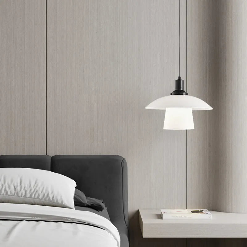 Minimalist black bedside pendant lamp with glass shade and three-colour light fitting