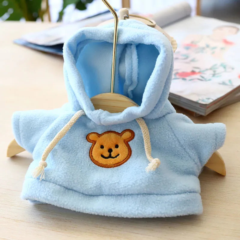 A blue cloth dog hoodie sweater shown next to a grey bear design sweater, illustrating the two available size options.