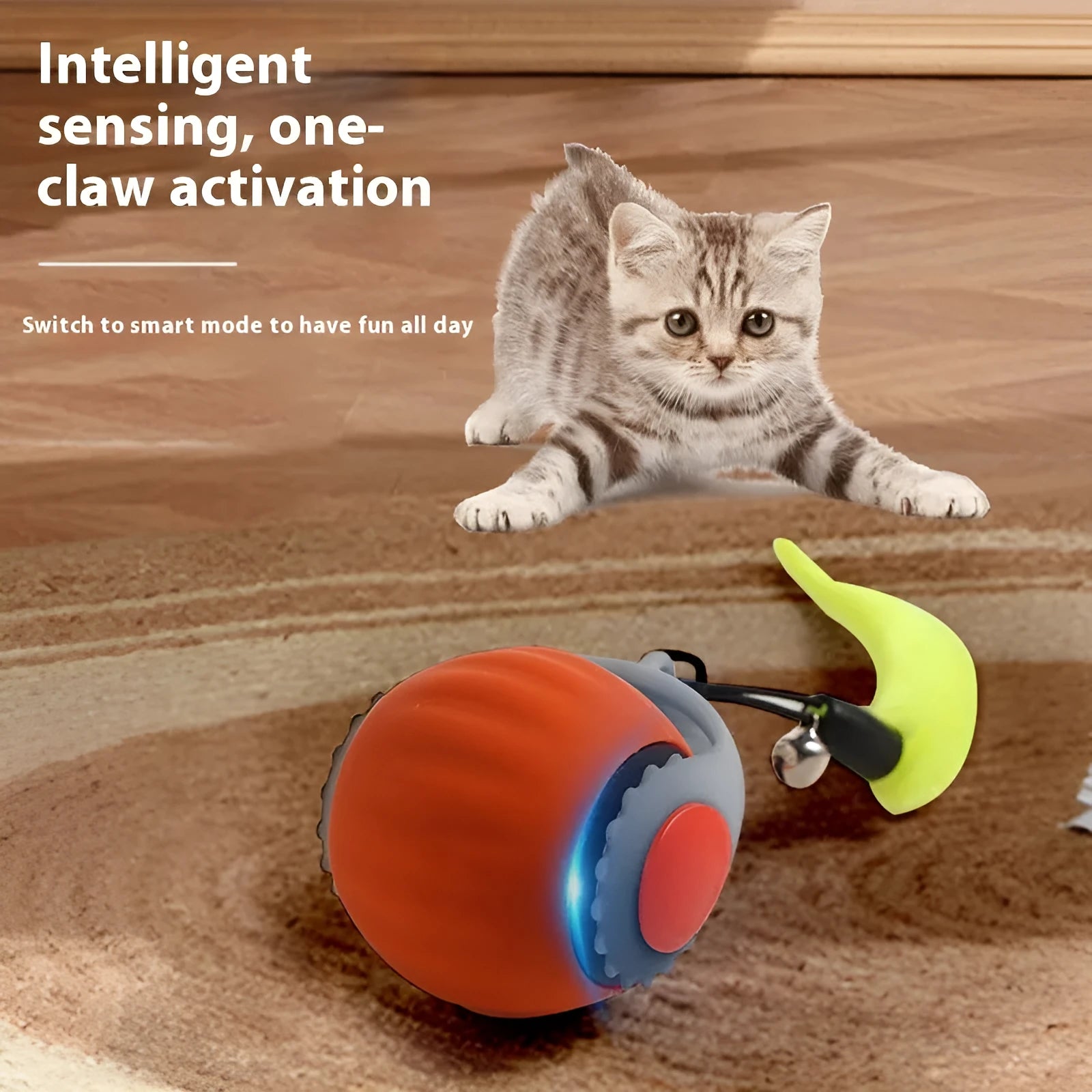 Automatic rolling cat toy ball in silicone with blue or orange colour options and gun grip handle