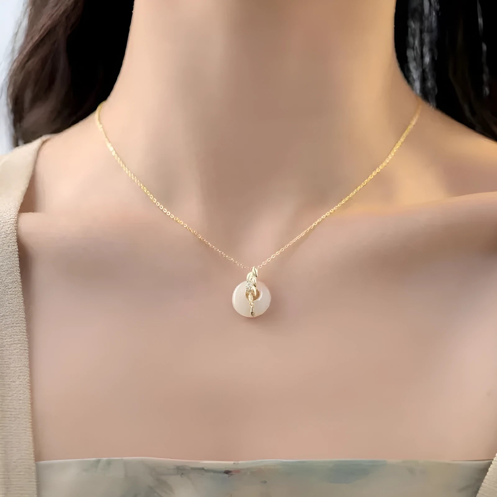Chinese style wheat necklace with 925 silver chain and jade-inlaid pendant on white background