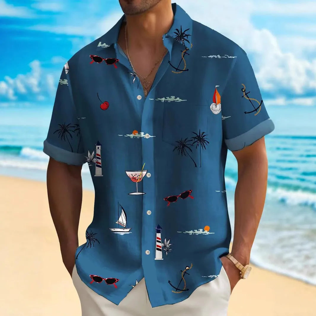 Man wearing a colourful loose-fit Hawaiian print short sleeve shirt.