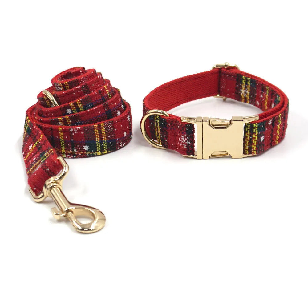 Red Christmas pet collar set with matching traction rope, bow, chest-back harness and waste bag holder