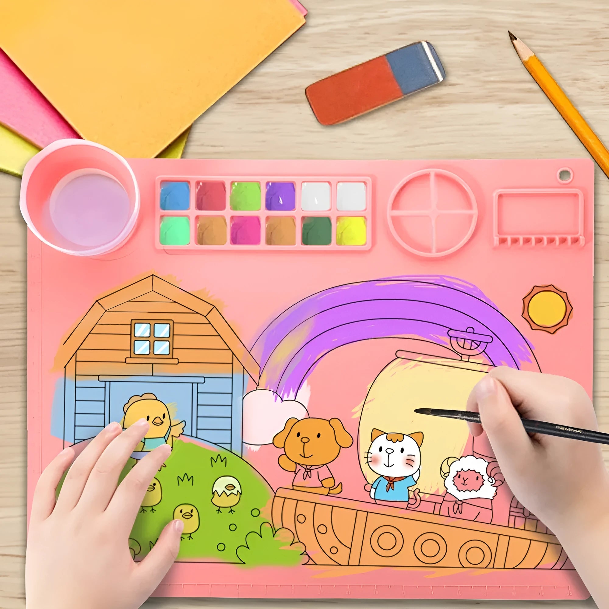 Large light blue silicone painting mat with dimensions 50cm by 40cm laid flat on a table.