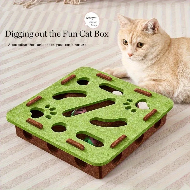 Interactive cat puzzle toy with felt maze tunnel and bell ball on a carpet