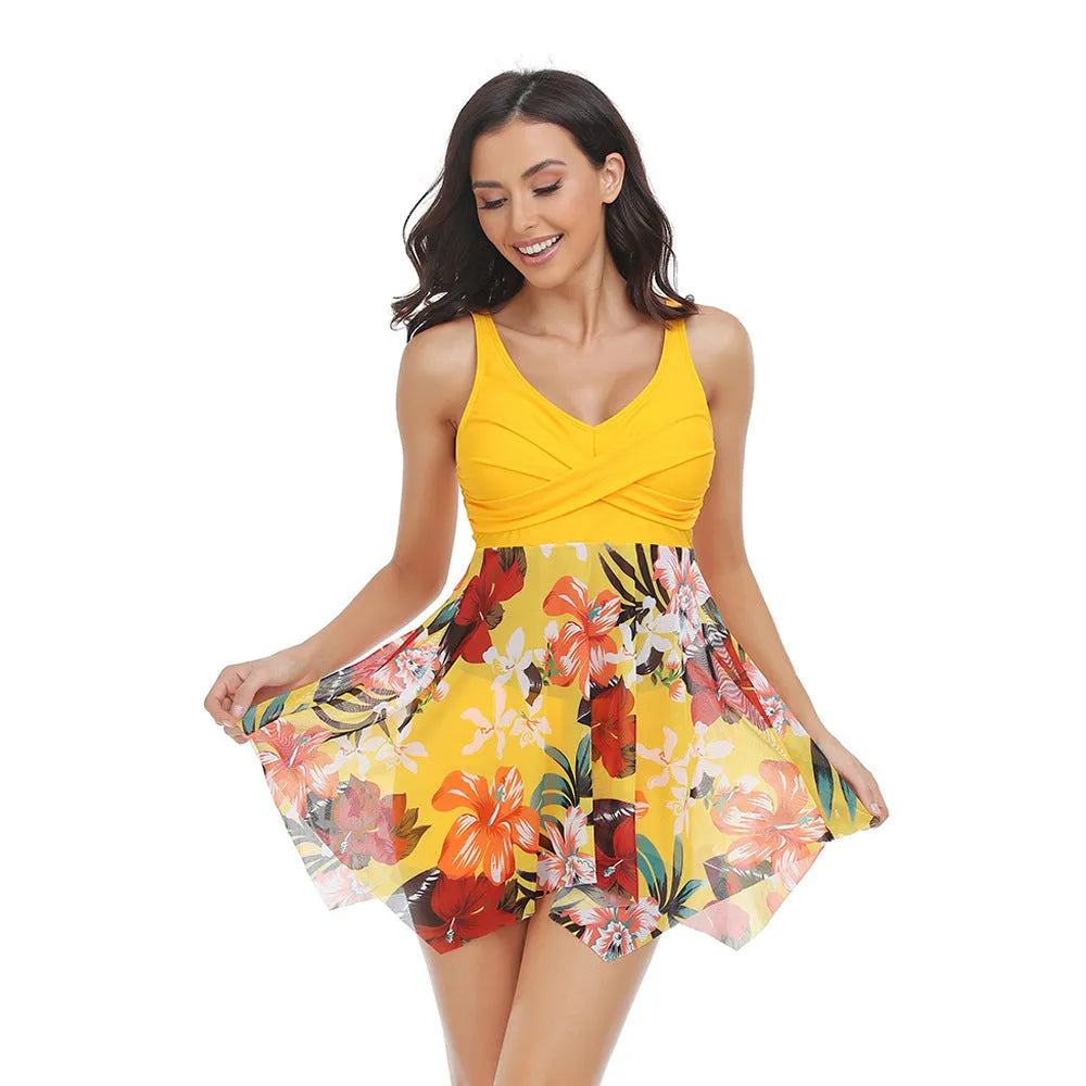 Women's one-piece swimsuit with attached tulle skirt and high-leg split design.