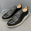 Men's white low-top casual shoes with embossed pattern texture on the front, featuring front tie laces.
