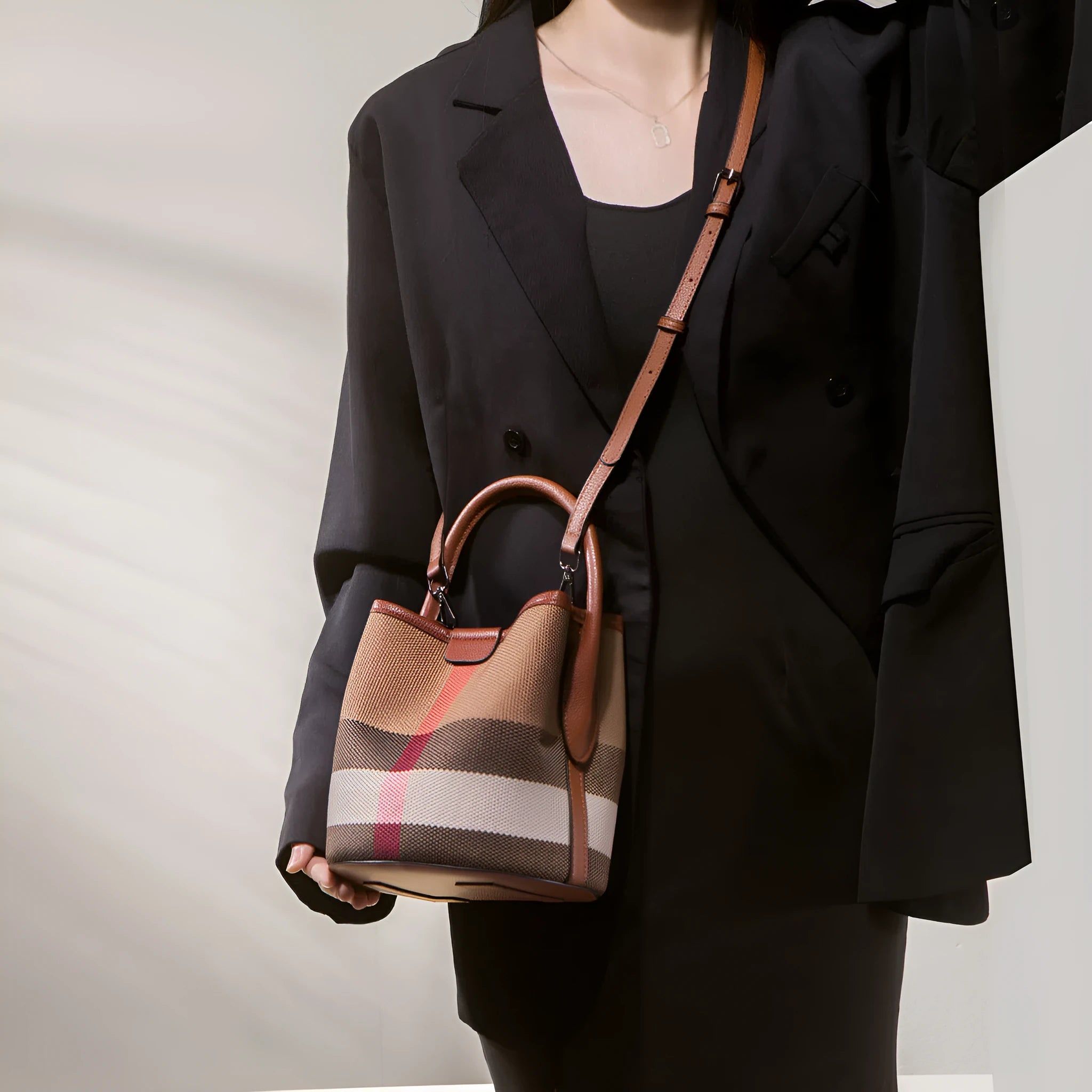 Plaid brown canvas bucket handbag set with large and small bags and single shoulder strap