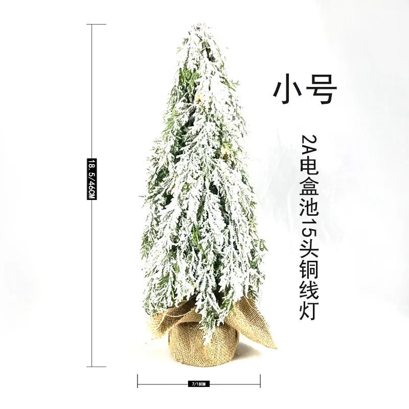 24 inch desktop Christmas tree with battery-operated snow sprayer lights and ornaments