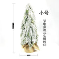 24 inch desktop Christmas tree with battery-operated snow sprayer lights and ornaments