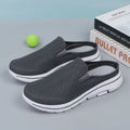 Breathable mesh toe holder slippers in solid colours on a flat heel sole.