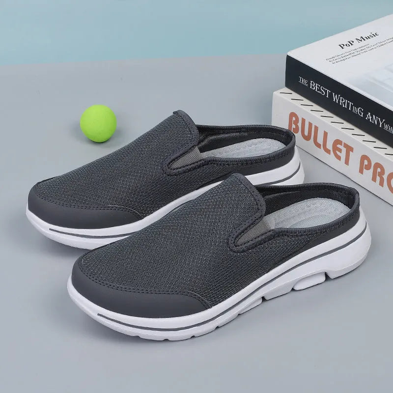 Breathable mesh toe holder slippers in solid colours on a flat heel sole.