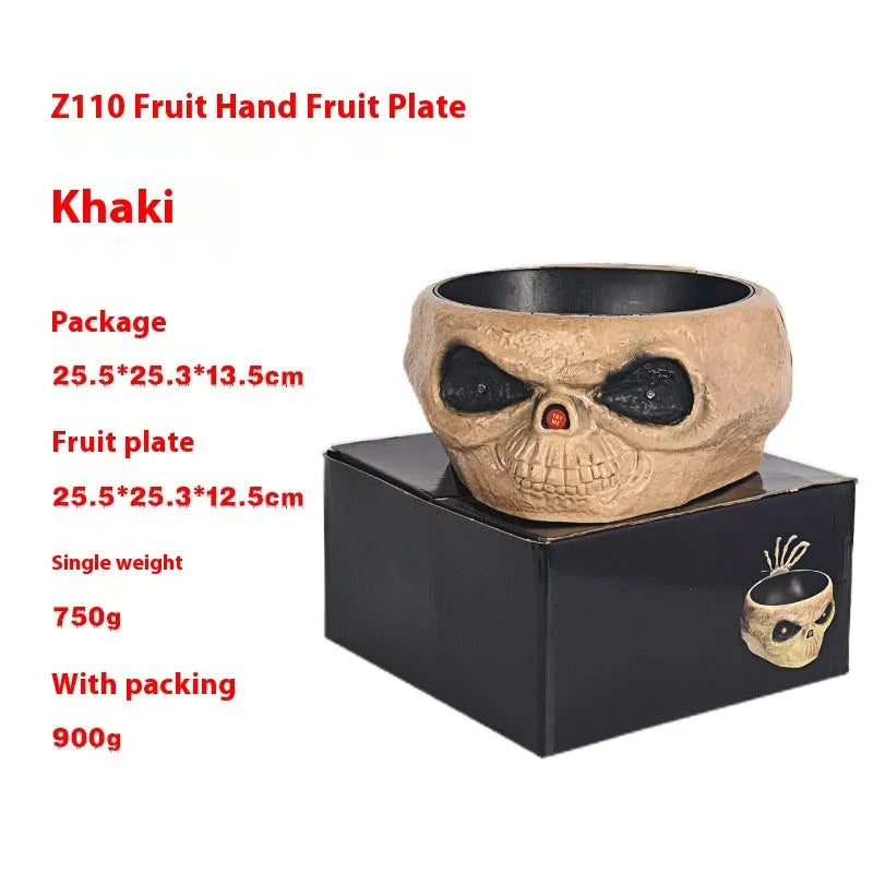 Motion activated Halloween candy bowl plastic pumpkin shape with skeleton hand and glowing red eyes