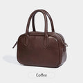 Small square retro messenger bag in black or coffee colour with single shoulder strap