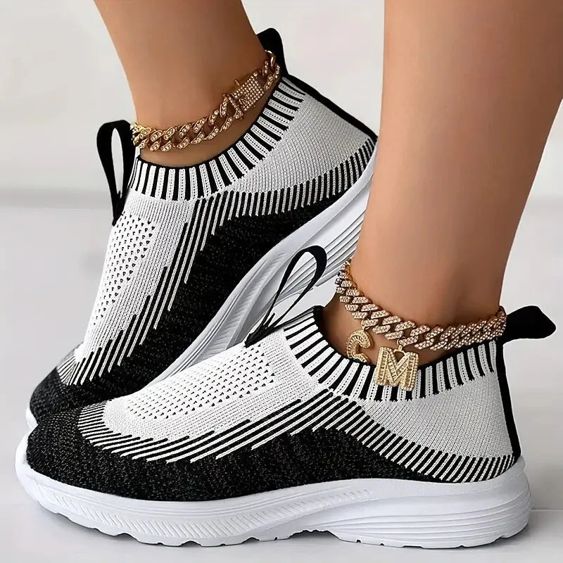 Women's casual sports shoes with breathable mesh upper in solid colour, side view