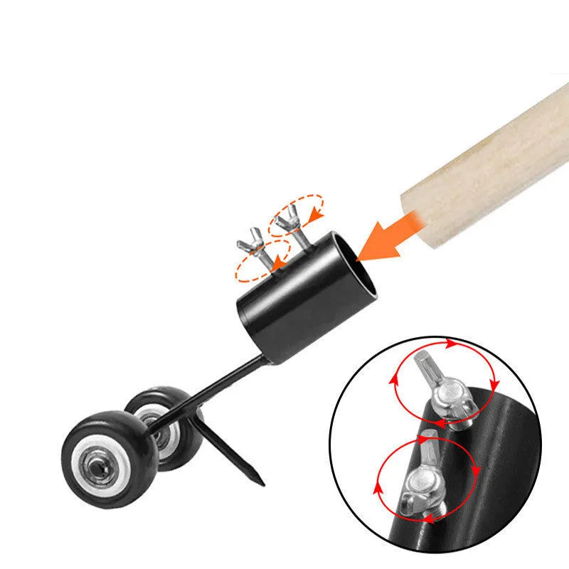 Close-up of iron manual weed puller head with double knife tines on a cracked patio surface