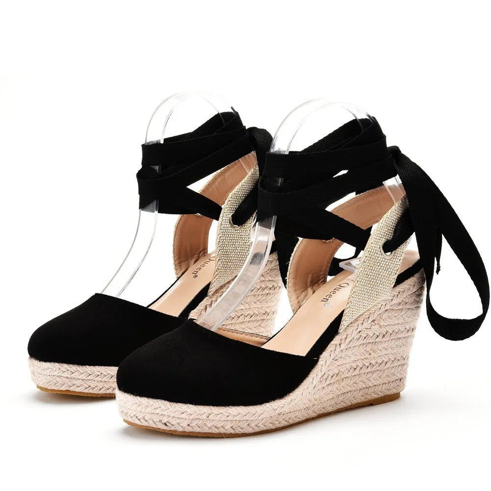 Women's red bohemian wedge sandals with beaded tassel decoration and a buckle strap.