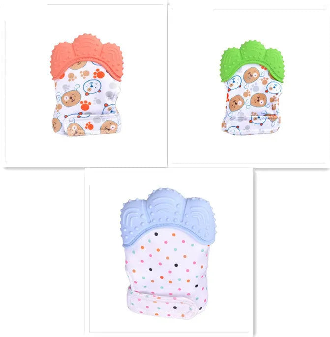BPA-free silicone baby teether glove fastened with a white Velcro strap on a baby's hand