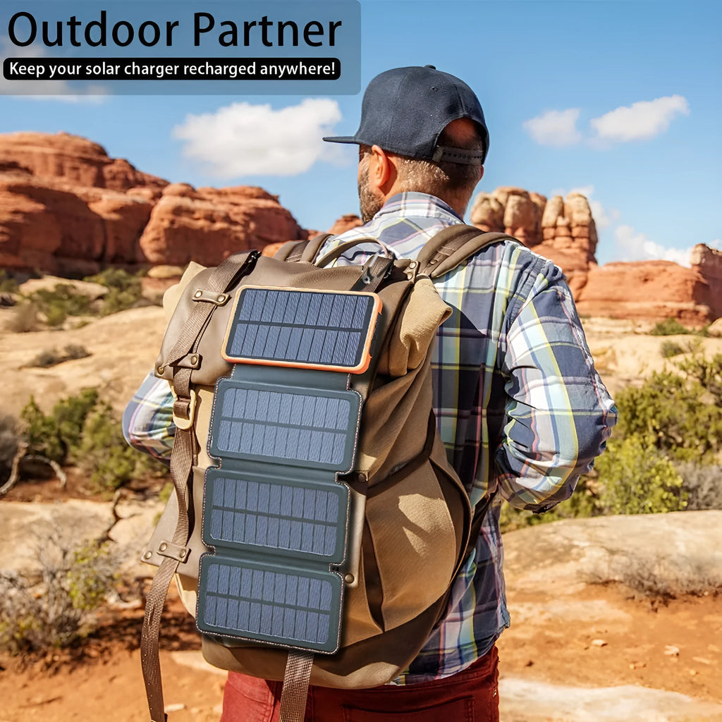 Black outdoor solar power bank with leather finish, showing solar panel and USB ports, next to a charging cable.