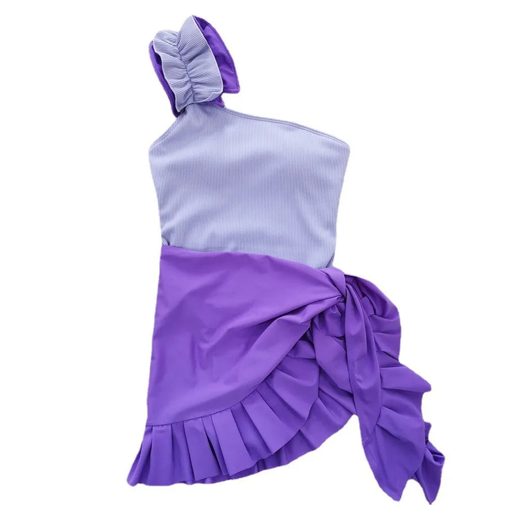 Women's single-shoulder high-waisted one-piece swimsuit in solid colour.
