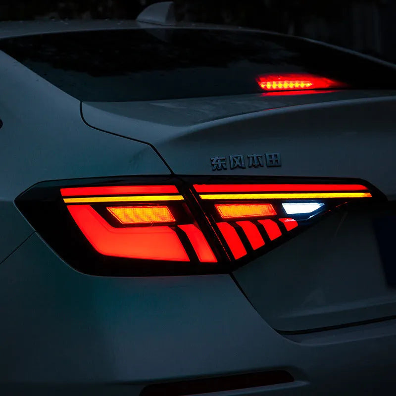 Black and red LED tail light assembly for 11th generation Honda Civic with sequential turn signals.