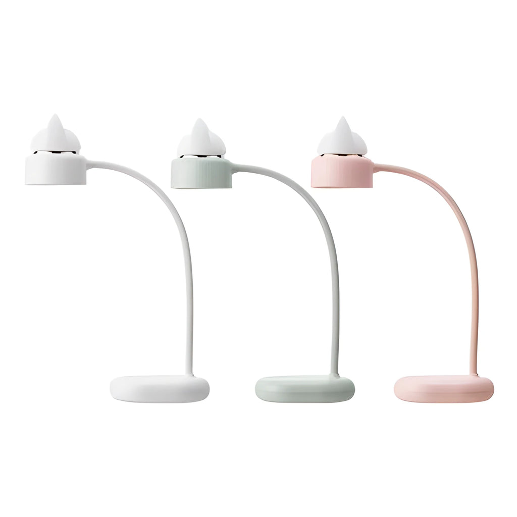 White rechargeable LED clip desk lamp with touch controls on a wooden desk.