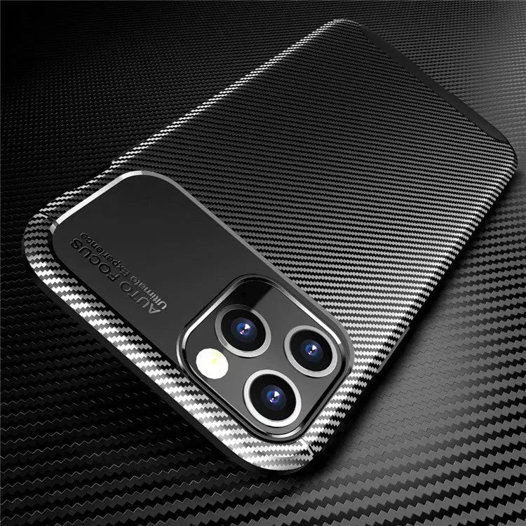 Black silicone protective case for an iPhone 12 smartphone on a table.