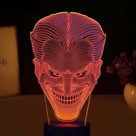 USB-powered 3D acrylic LED table lamp showing colourful gradient lighting on a desk.