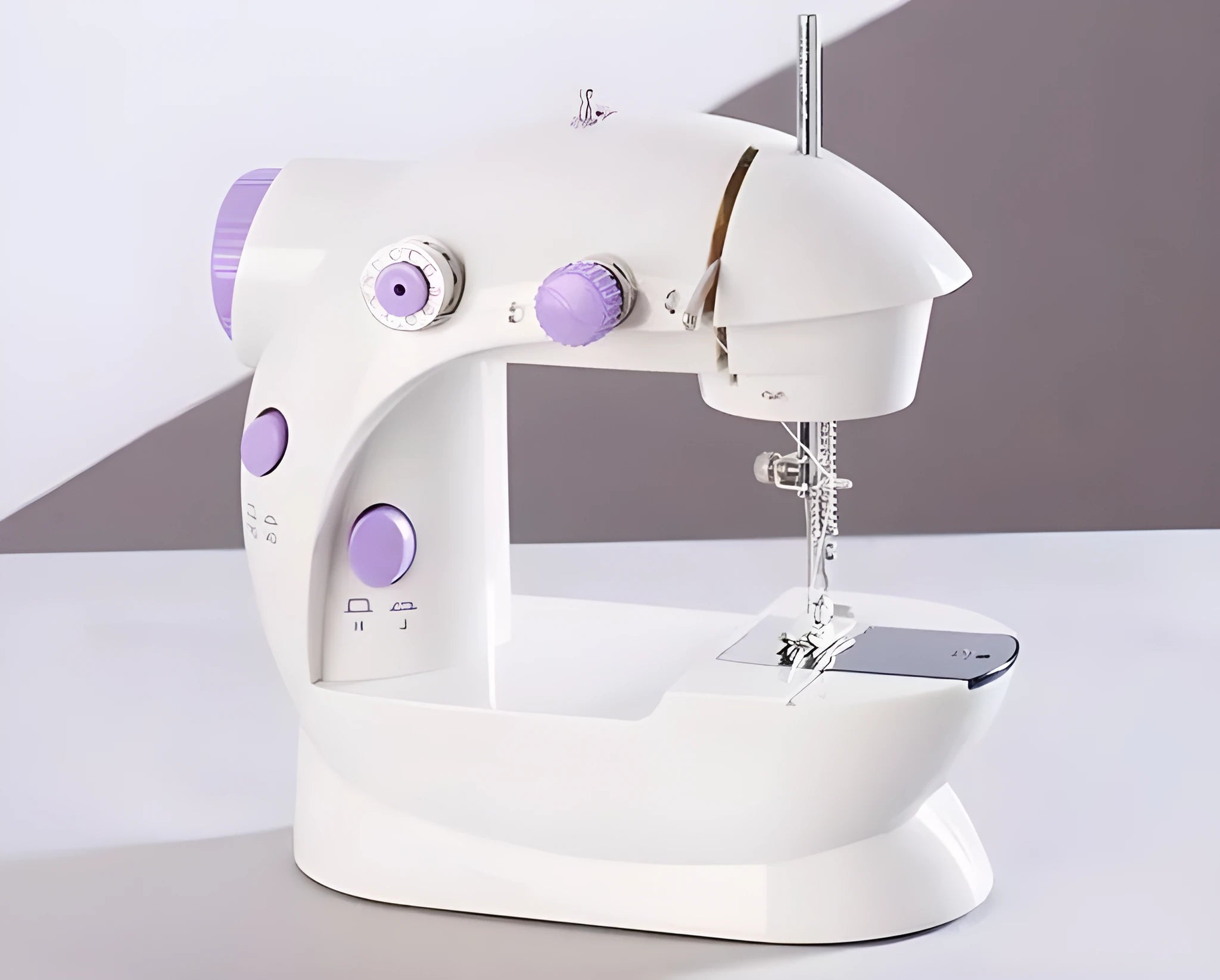 Electric mini household sewing machine showing compact 20cm size with power supply and accessories